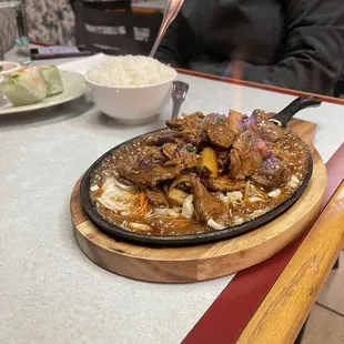 Flaming beef they light it on fire right at the table