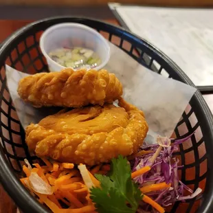 Curry Puff (2) with diced potatoes, carrots, and peas with Cucumber-red onion relish sauce - yum. November 2024.