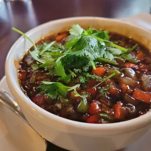 a bowl of soup on a plate