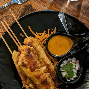 Grilled pork skewers (kao niew moo ping)