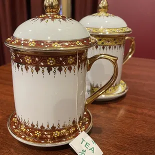 two cups and saucers