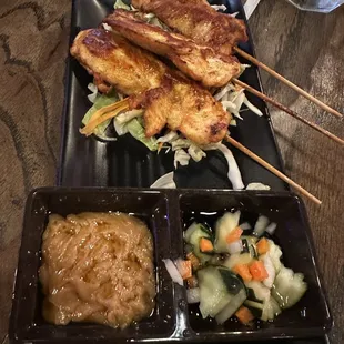 A4. Chicken satay (3 sticks)