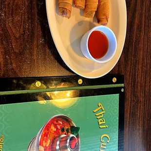 Menu and complimentary spring rolls