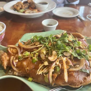 Spicy crunchy Trout. It was absolutely delicious. It was very flavorful. It definitely is a must try!