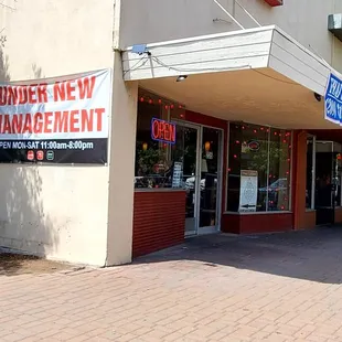 Thai Cuisine storefront/side of building.