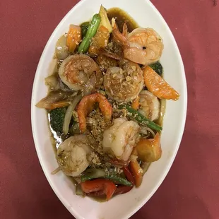 a bowl of shrimp and vegetables