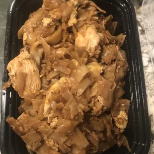 Two orders of chicken pad see ew that can fit Into one box...
