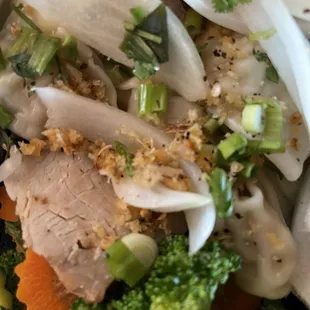 wonton soup packed up separate from broth.  mushy crunchy breaded nutty topping all over everything.