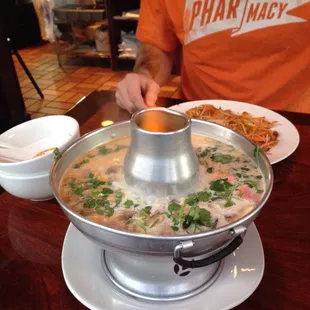 Tom Kha soup...on fire! It's fun to order this is you're going to eat there!