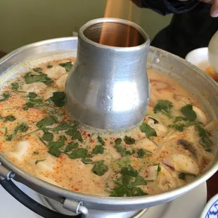 Delicious Tom Kha with beef, shrimp, and squid.
