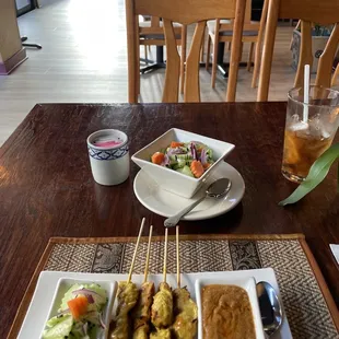 Chicken satay and cucumber salad
