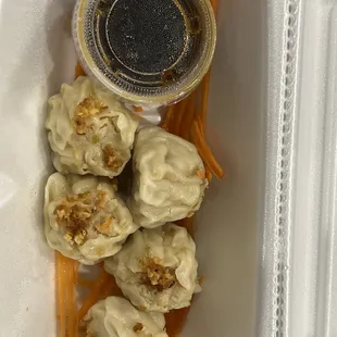 Steamed pork dumplings with soy sauce