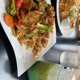 Drunken noodles (front) and Pad Thai (back)