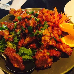 Orange chicken--good, not great.  Bigger slices of chicken with less breading would help