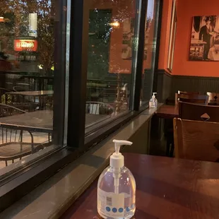 a bottle of hand sanitizer on a table