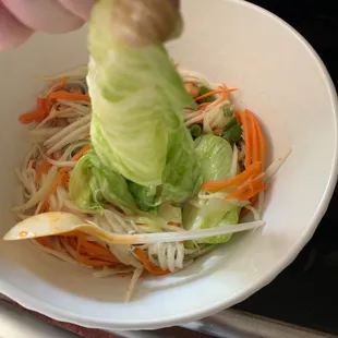 Soggy inedible papaya salad hot as the rest of the food.