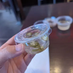 Pickled jalapenos. We had to ask for more 4x. Why can&apos;t they just give in a big container?