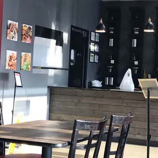 a table and chairs in a restaurant