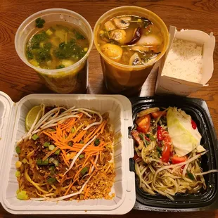 Doordash. Soup spilled in bag.    Tomyum seafood. Rice soup. Som tum w/salty cwab. Pad thai