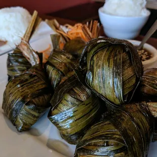 Chicken wrapped in pandan leaves.