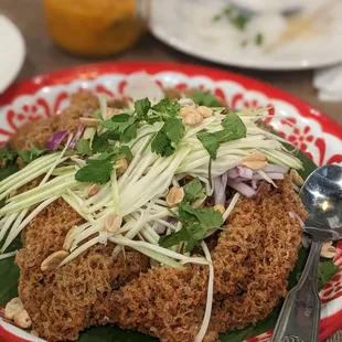 - Yum pla duk fu (crispy catfish salad), a seasonal special