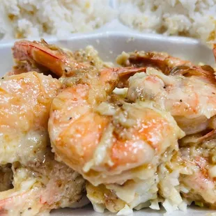 a plate of shrimp and rice