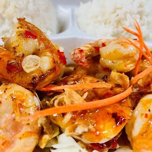 a plate of shrimp and rice