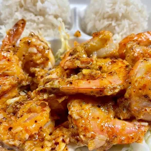 a plate of shrimp and rice