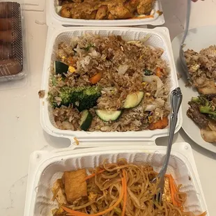 Chicken satay (up top), veggie fried rice (middle), pad thai with tofu (bottom)