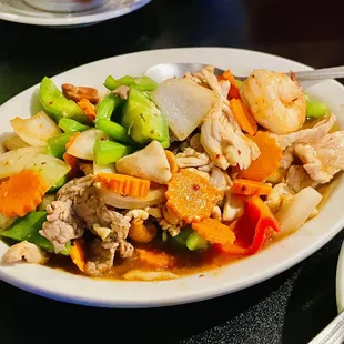 a plate of chicken and vegetables