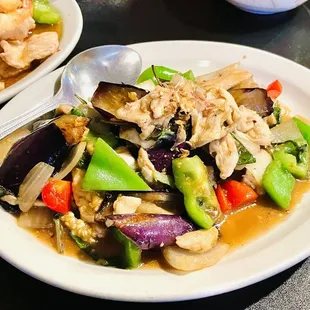 a plate of stir fried vegetables