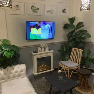 a living room with a flat screen tv
