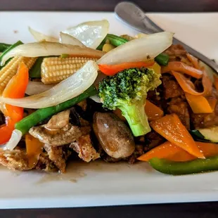 a plate of stir fried vegetables