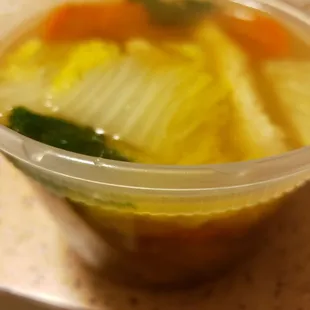 a bowl of soup on a counter