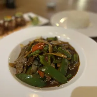 a plate of stir fried vegetables