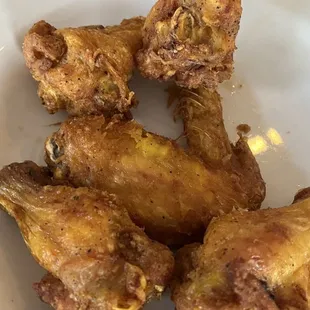 fried chicken wings on a white plate