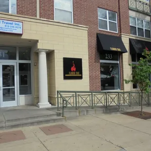 Outside of the building, view looking east.