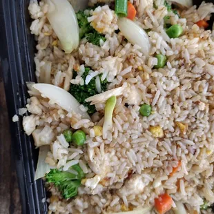 rice and vegetables in a plastic container