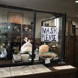 a mask please sign in the window