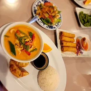 Panang curry lunch special which includes side salad and gyoza dumplings. Added egg rolls and edamame appetizer