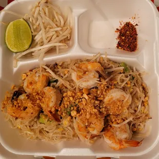 shrimp and noodles in a styrofoam container