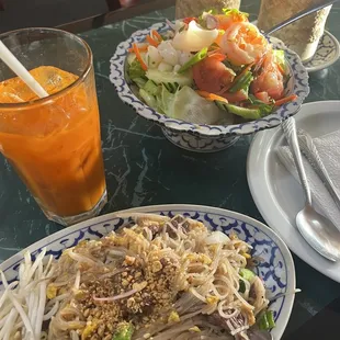 92. Pad Thai (Beef) , Thai Ice Tea , 32. Seafood Salad with Rice