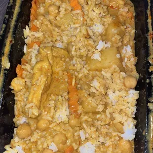 Yellow Curry with Tofu - very large portion. This is half way through I mixed remaining Jasmine Rice in to bring for lunch tomorrow!