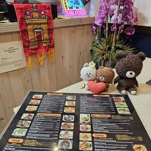 Grumpy Bear wants to look at the menu, too!