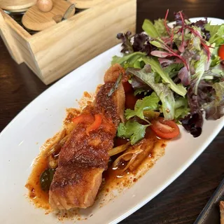 Crispy Salmon Tom Yum Sauce on Arugula Bed