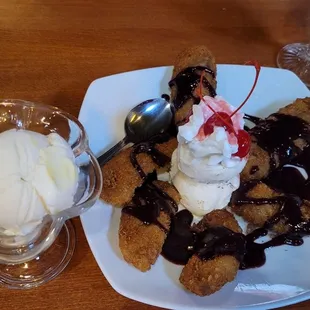 Thai Gusto - side of coconut ice cream, $4.99. Fried banana with vanilla ice cream,  $7.99