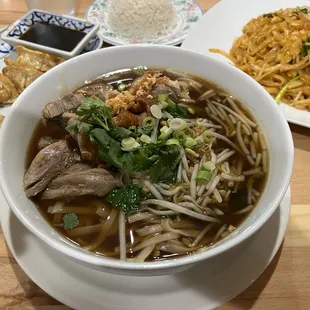 Duck Noodle Soup with Chicken Pad Thai, Pot Stickers and Steamed Rice.