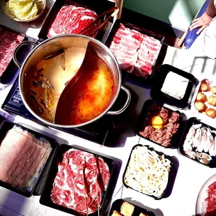 Thai Hot pot style with divided pot ,varieties of Thai Broth and Sauce