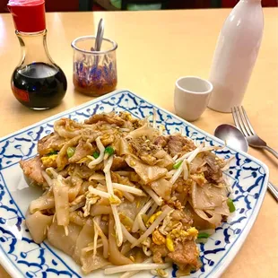 #84 - Gai Kua, pan fried rice noodles with egg, bean sprouts, chopped peanuts, green onion and your choice of protein.