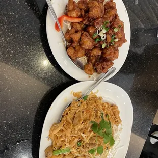 Chicken pad Thai and orange chicken.